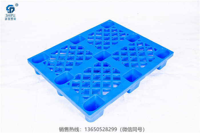 供應重慶潼南九腳塑料托盤 1.2米*1米網(wǎng)格塑料托盤廠家直銷